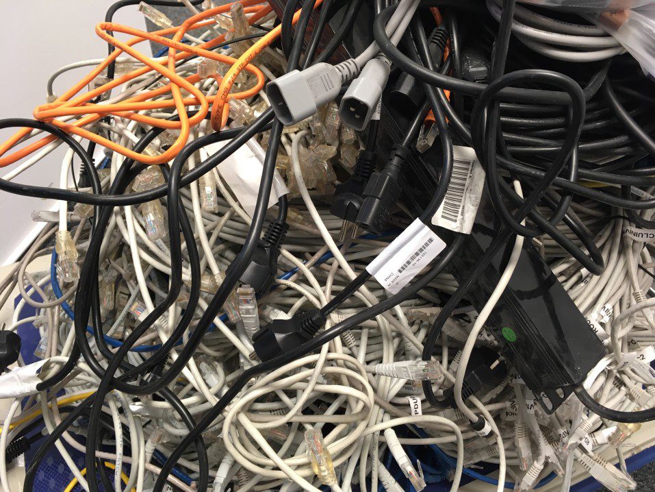A bunch of data cables piled together